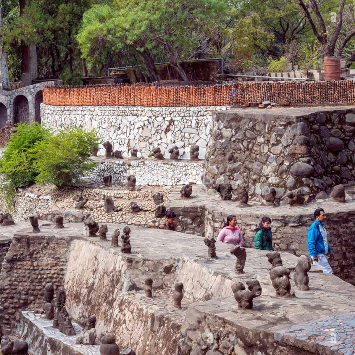 nek-chand-rock-garden-in-chandigarh-punjab-india-EHCX5E lmb Logo
